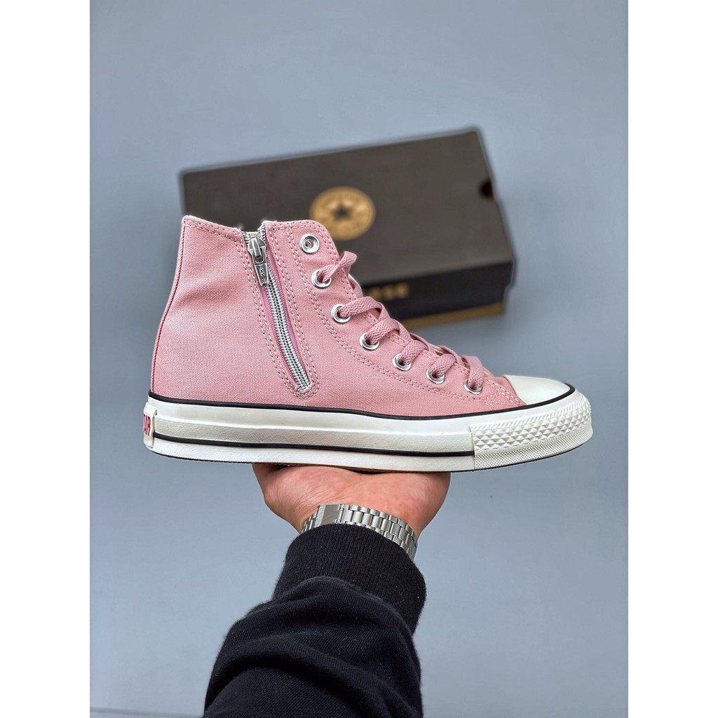 Converse with clearance zipper on tongue