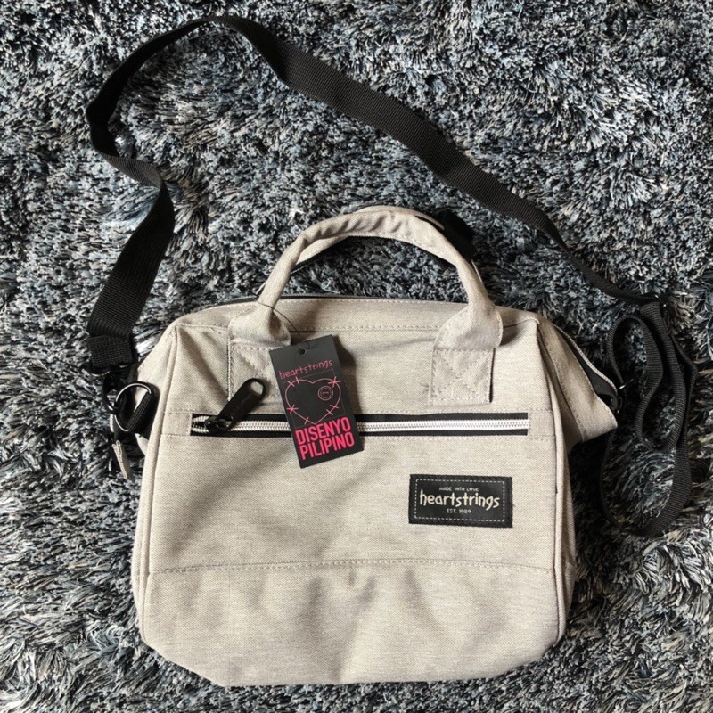 Heart string outlet bag