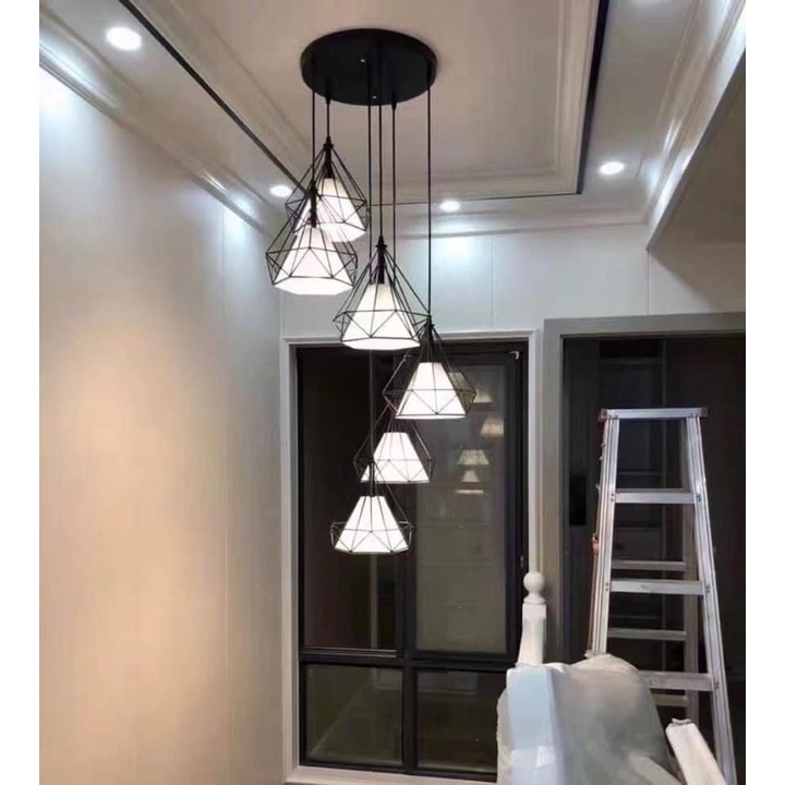 Hanging light store for stairway