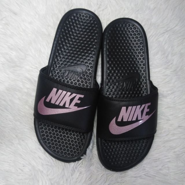 Rose gold and black nike online slides