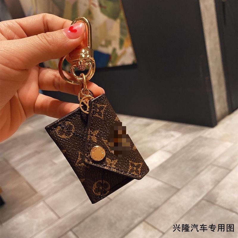 Shop Louis Vuitton Kirigami Pouch Bag Charm And Key Holder (M69003) by  lufine