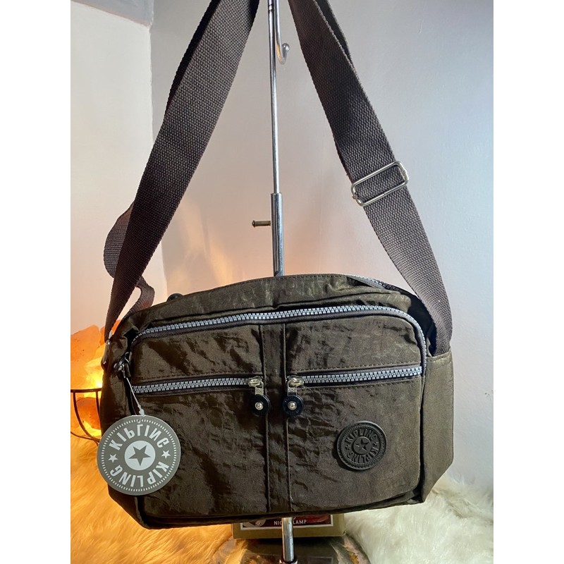 Kipling black sling outlet bag