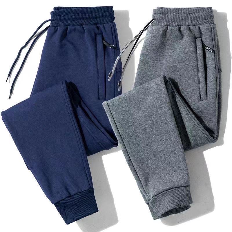 Jogging pants with online zipper pockets