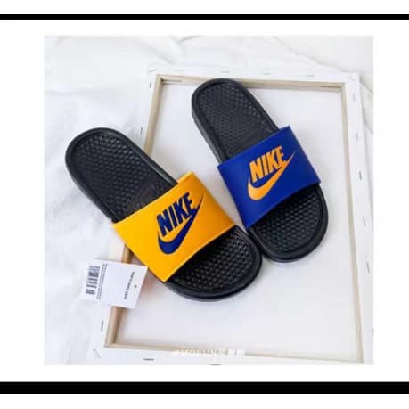 Nike slides blue store and gold