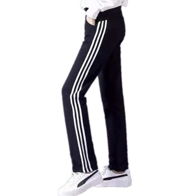 Black jogging pants with white online stripe