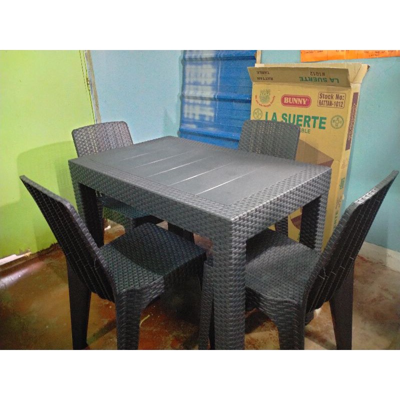 Plastic rattan dining outlet set