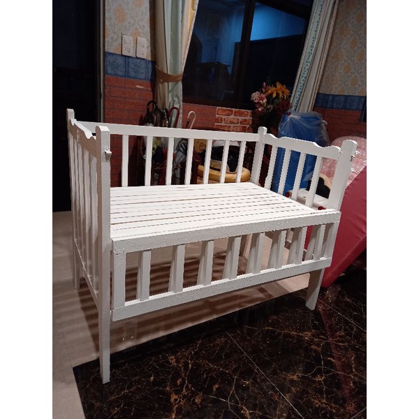 Cot with cheap adjustable side