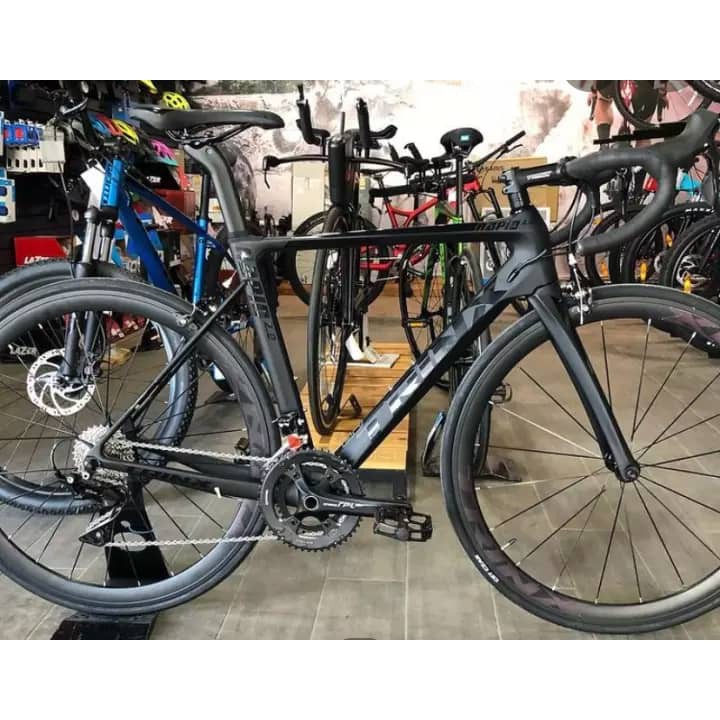 Trinx road best sale bike price