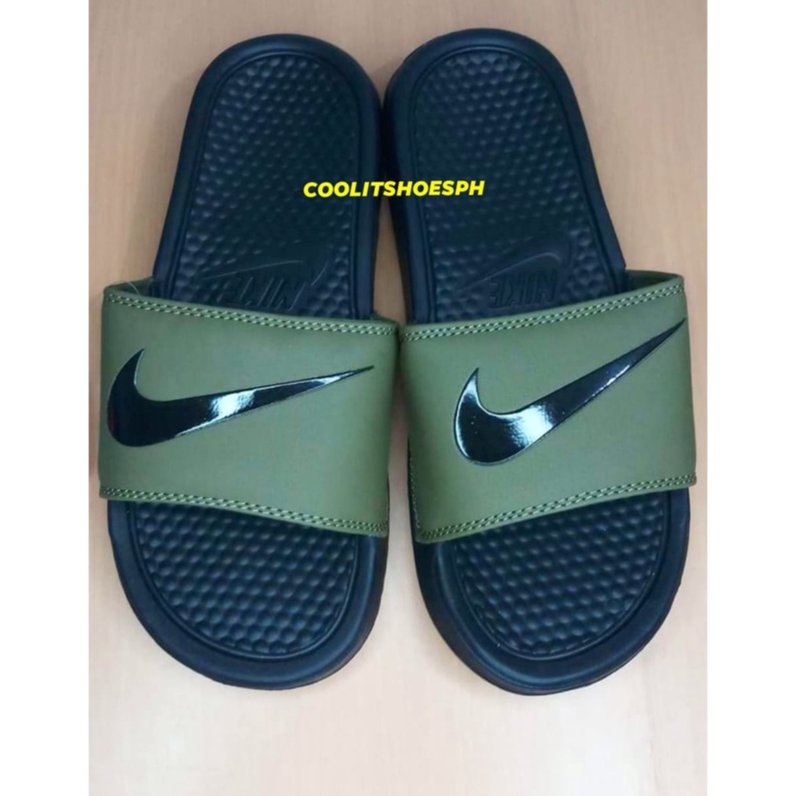 Nike slippers hotsell green and black