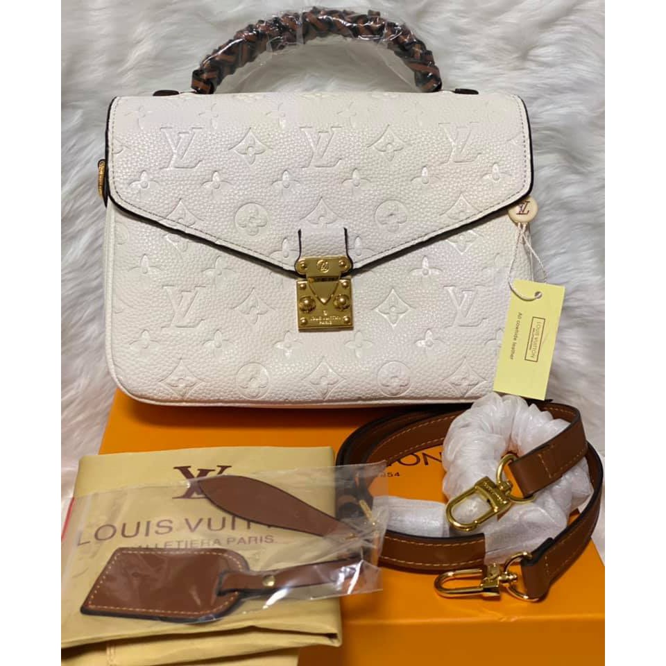 Louis vuitton pochette online metis braided