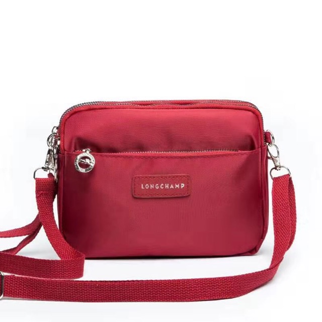 Longchamp sling 2025 bag price