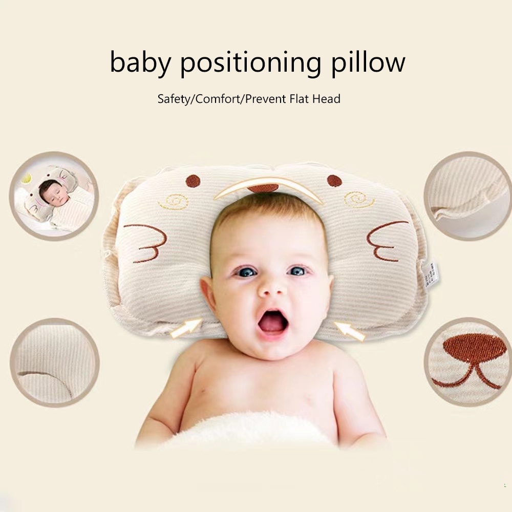 Baby positioning outlet pillow