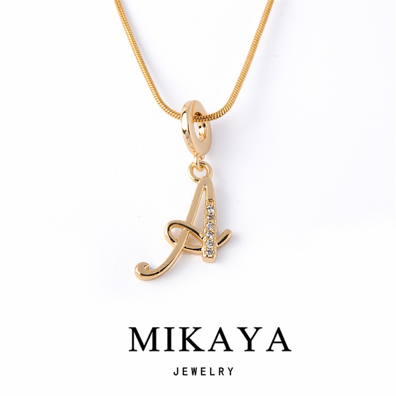 A alphabet store pendant in gold