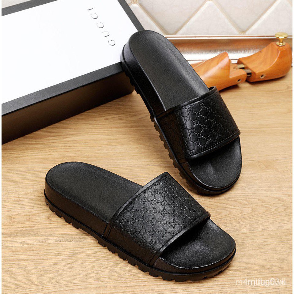 Black gucci best sale slides men