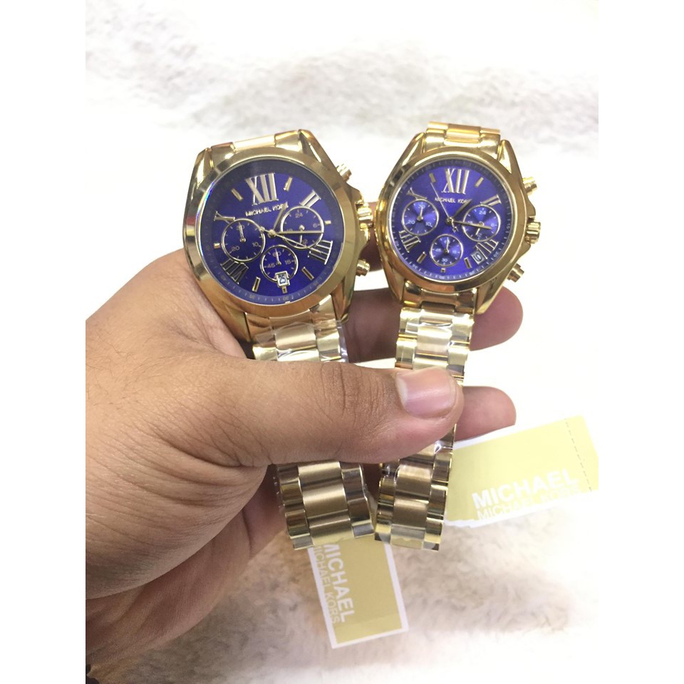 Michael kors gold on sale and blue watch