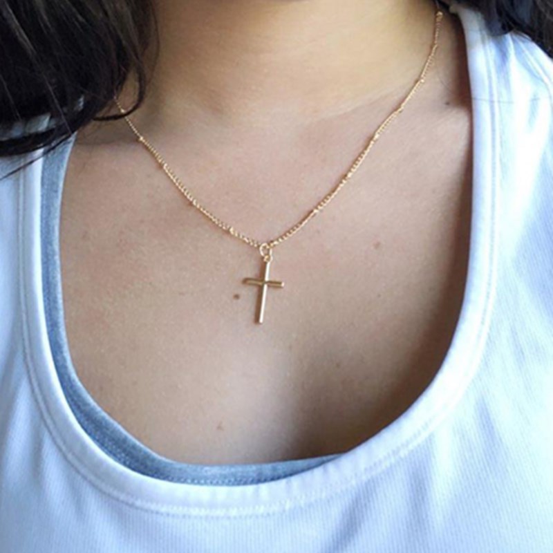 Women's small gold cross on sale necklace