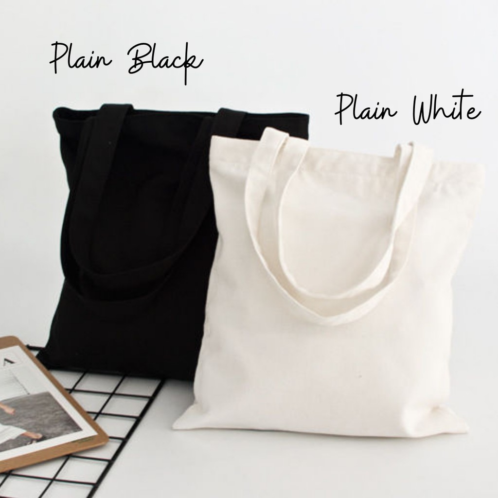 Black and white canvas tote deals bag