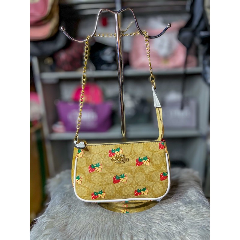 Coach bag with hot sale gold chain