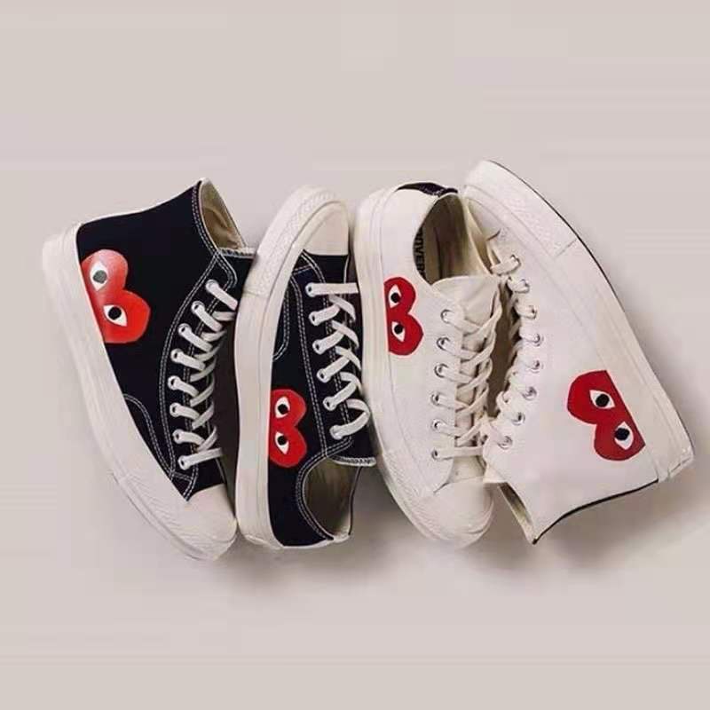 Converse with outlet heart on side