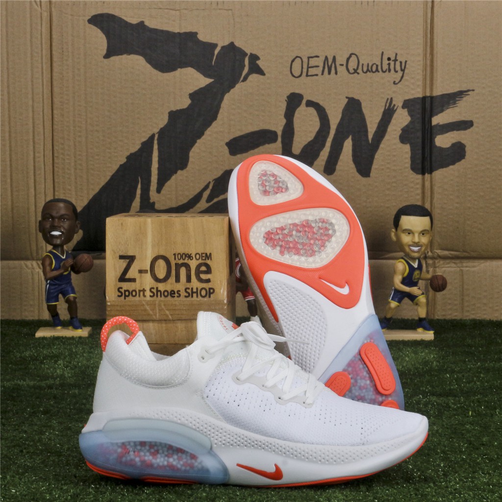 Nike white outlet orange shoes