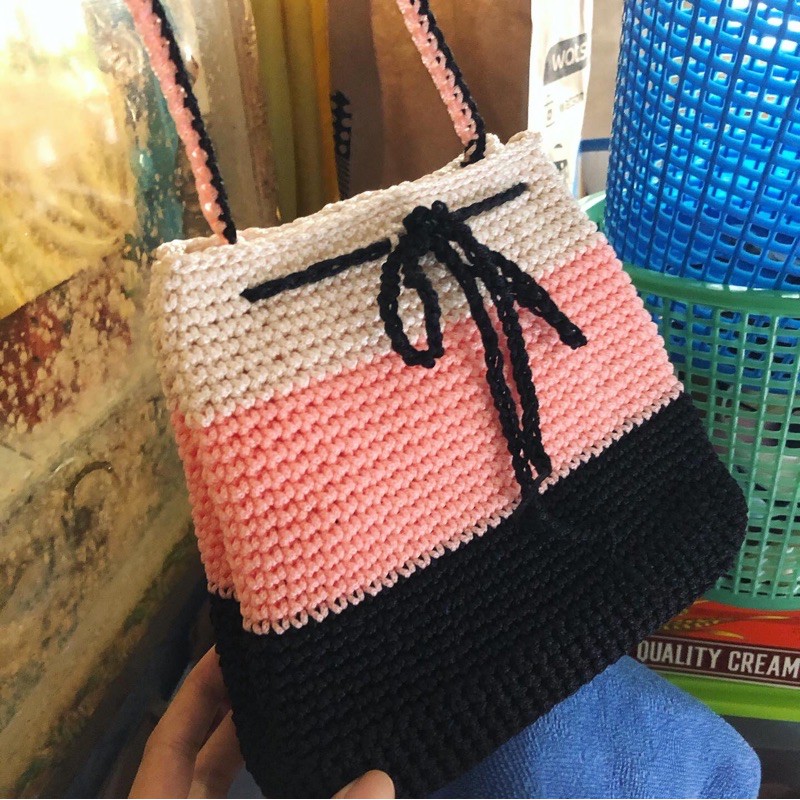 Crochet sling outlet bag