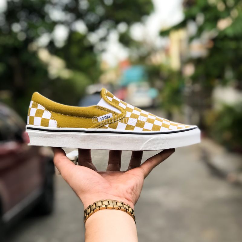 Yellow checkerboard slip on on sale vans