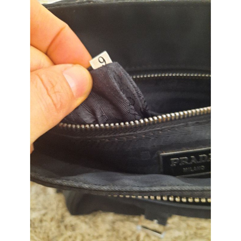 Prada serial discount number inside bag