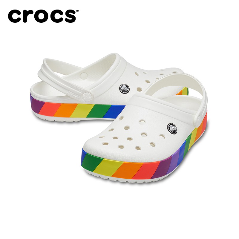 White crocs with online rainbow stripe