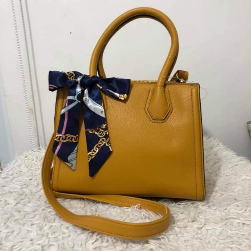 Aldo mustard 2024 yellow purse