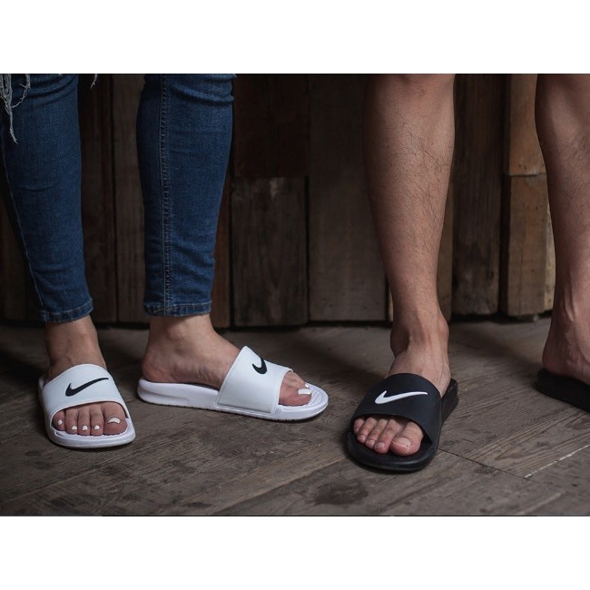 Nike benassi slides on feet hot sale