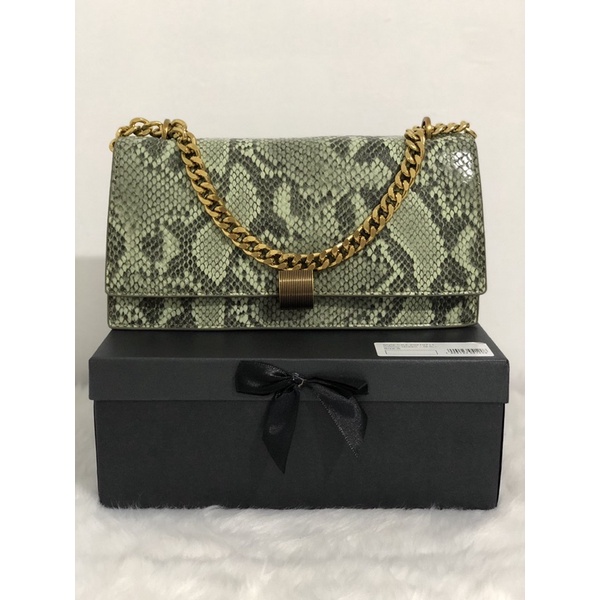 Charles and keith snake best sale print bag