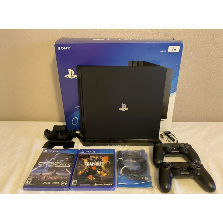 Ps4 1tb on sale two controllers