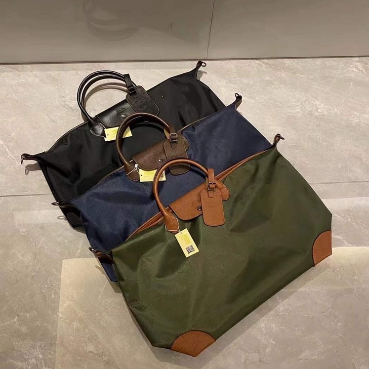 Longchamp duffle best sale bag sale