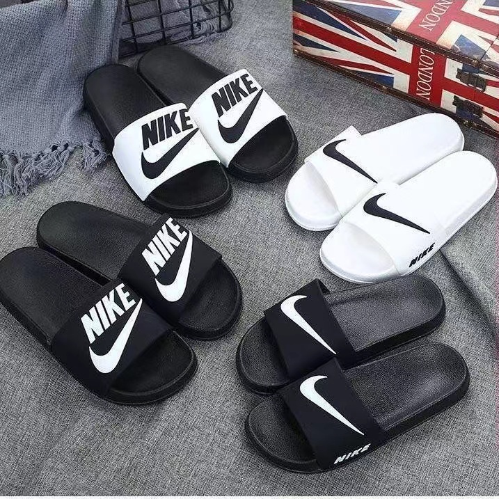 Slip on best sale slippers nike