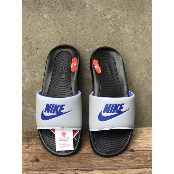 Blue and 2025 grey nike slides