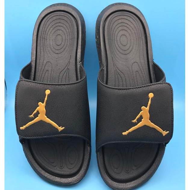 Jordan slippers outlet black and gold