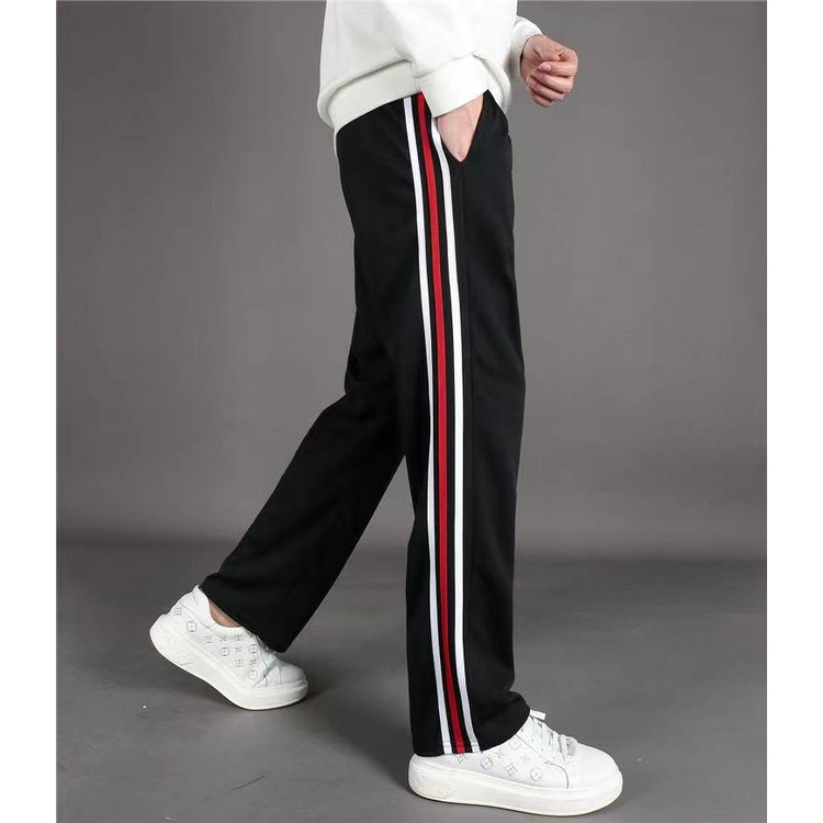 Track pants hot sale with red stripe