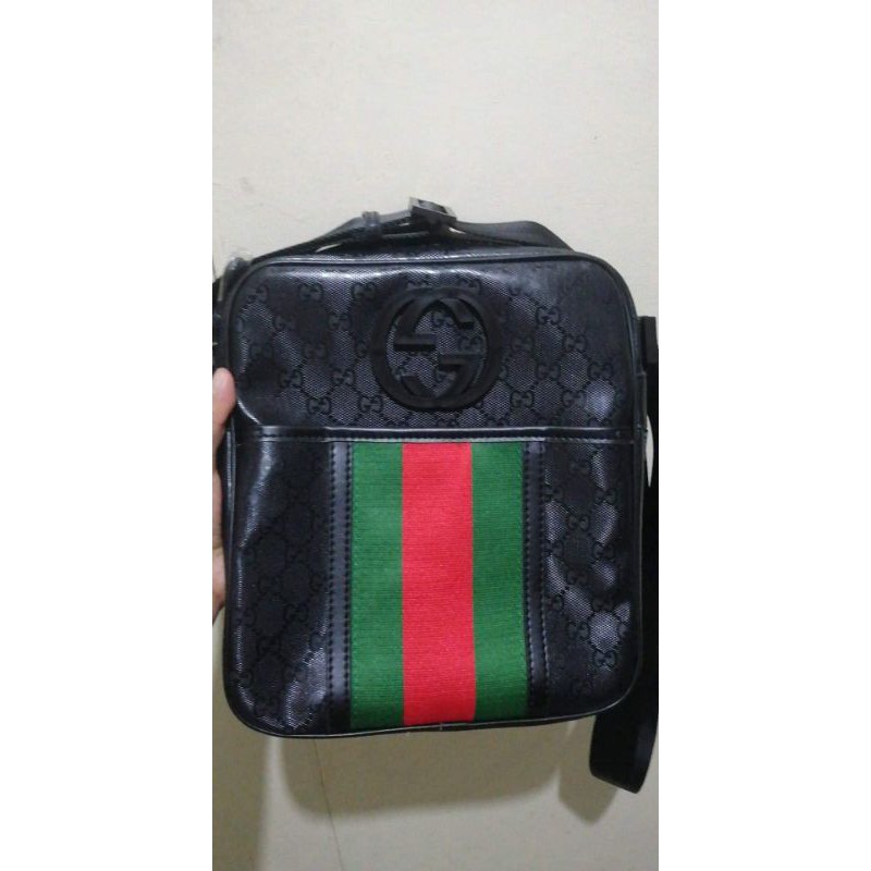 Gucci black discount sling bag price