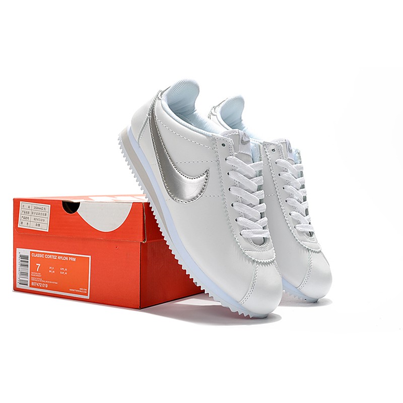 Nike cortez clearance white and silver