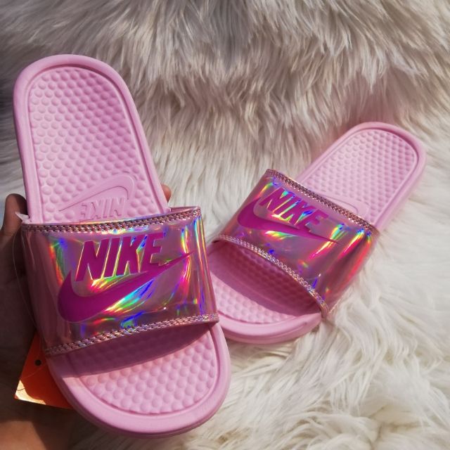 Pink and 2025 gold nike slides