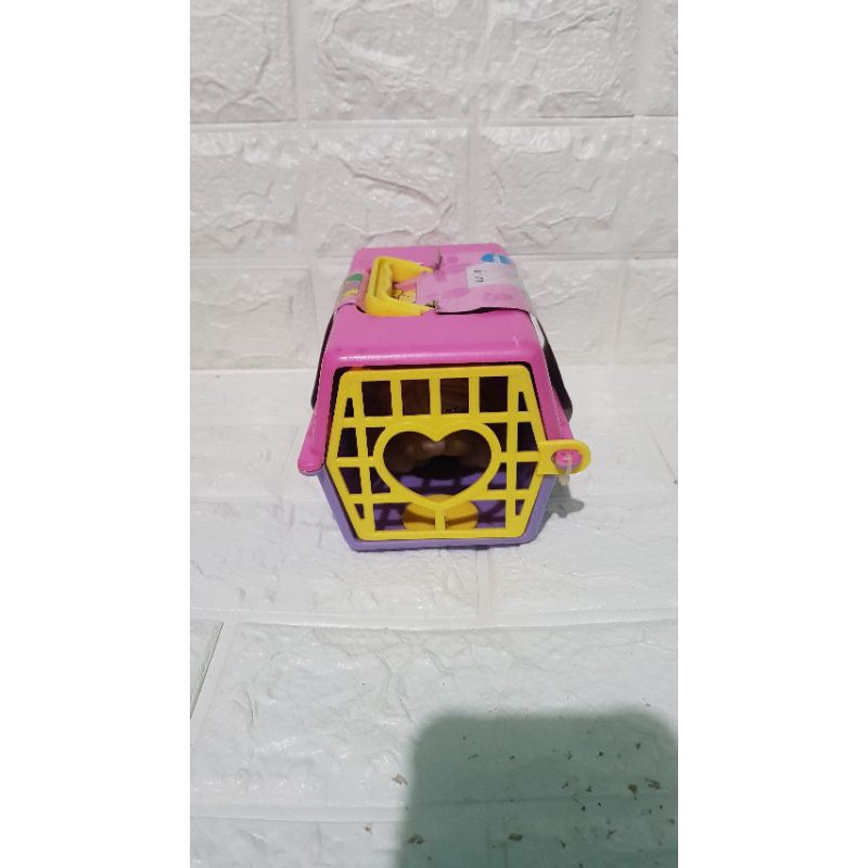 Dog in discount a cage toy