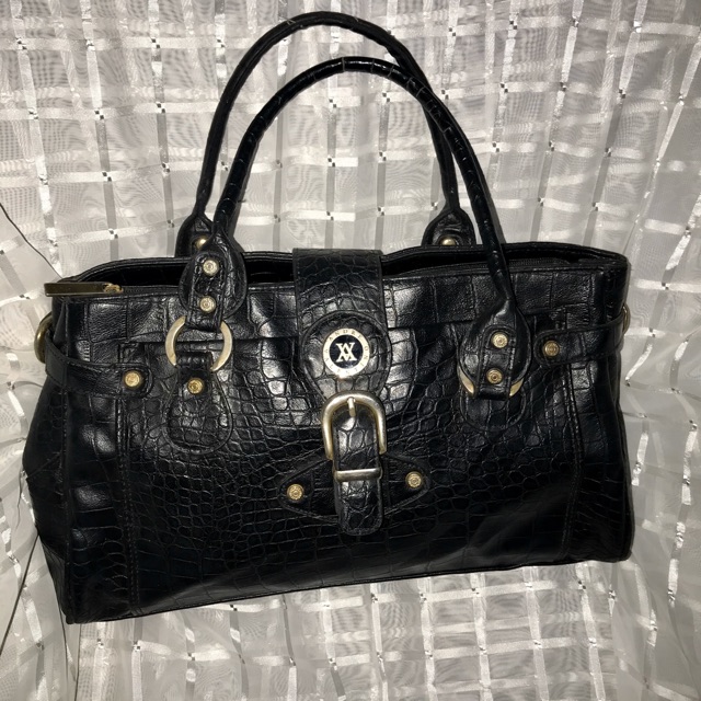 Andre valentino outlet bag price