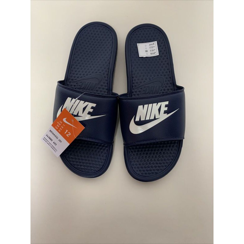 Nike slides store black and blue