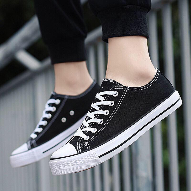 Low cut black and cheap white converse