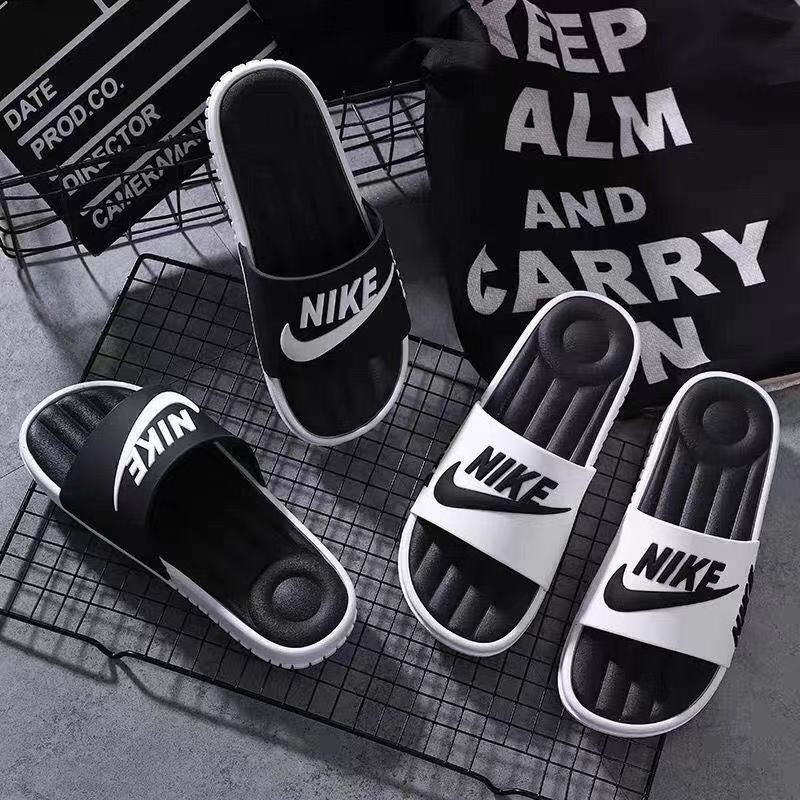 Nike best sale slippers unisex