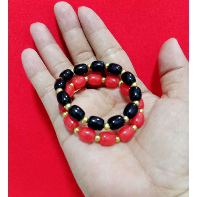 Red bracelet for baby on sale meaning