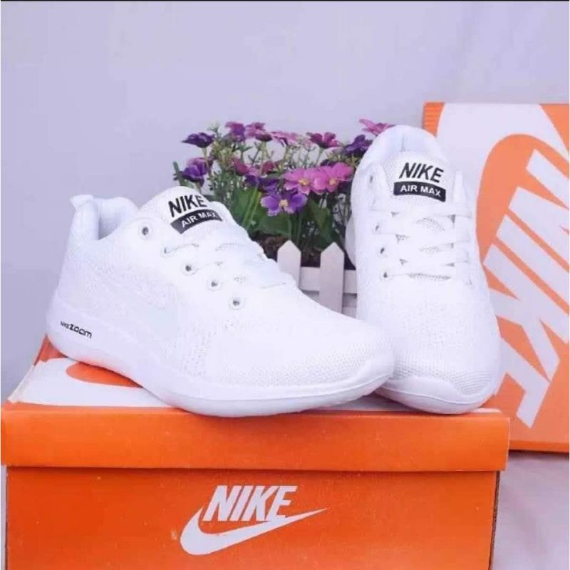 Nike rubber store shoes white