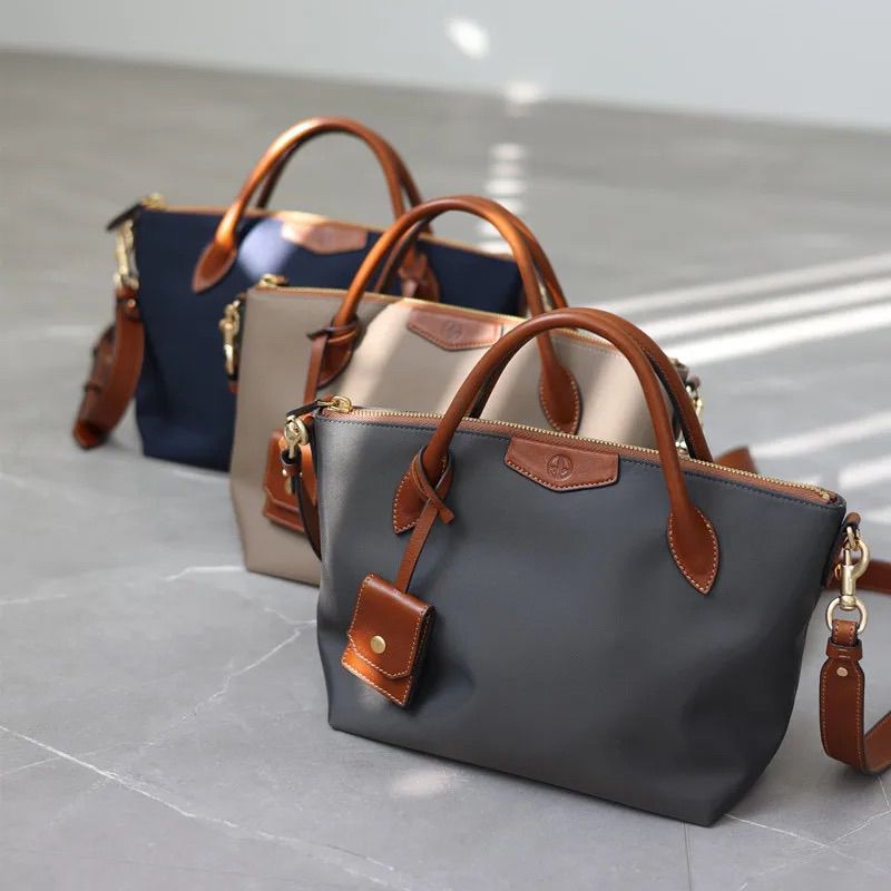 Canvas and leather handbag sales