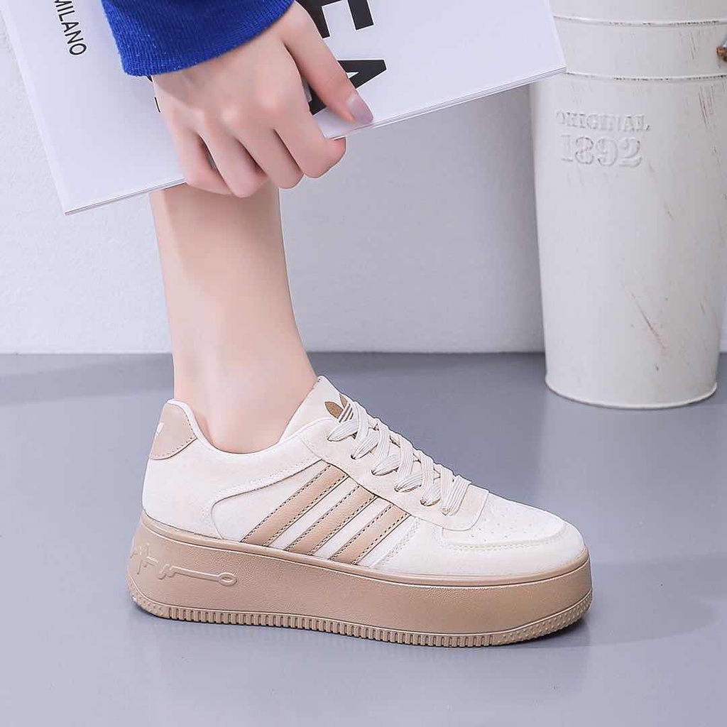 Adidas low cut store sneakers