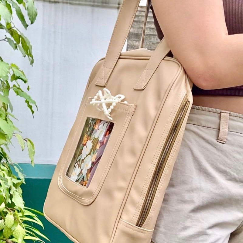 Canvas bag outlet for laptop